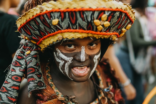 boy wearing tribal clothes