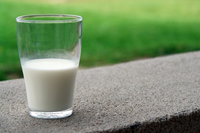 half full glass of milk